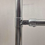 Uni-Fit one way ring connector securing two galvanised handrail tubes