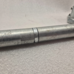 Uni-Fit handrail straight joiner connecting two galvanised steel rails on light background