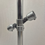 Uni-Fit two way split ring fitting mounted on vertical steel post with dual angled sockets