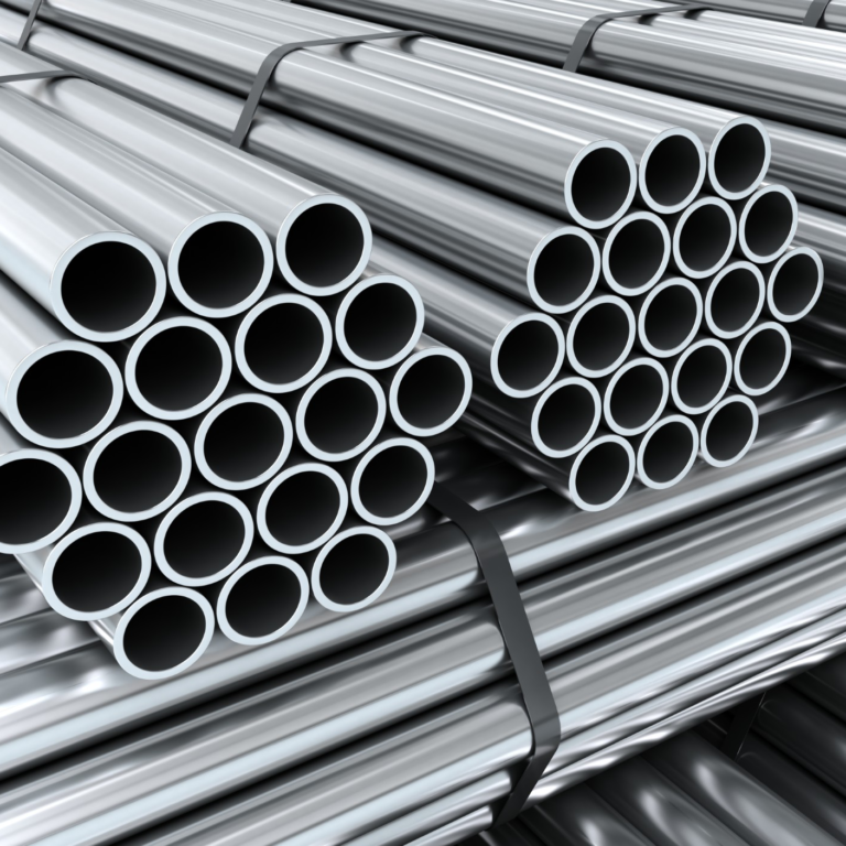 Uni‑Fit bundles of galvanised steel pipes stacked and secured with metal strapping