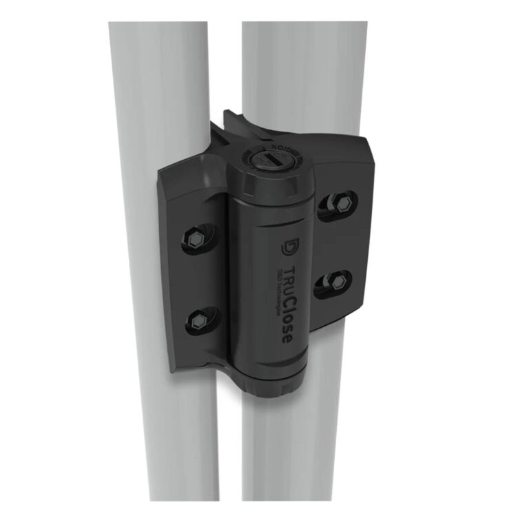 TruClose black self-closing hinge kit mounted between two gate posts for a Uni-Fit pedestrian swing gate