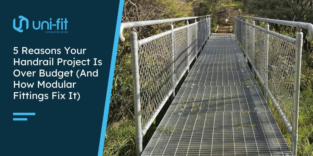 Metal walkway bridge with mesh handrails outdoors